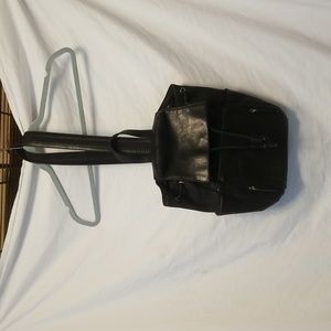 St John's Bay Crossover or Backpack Purse. Adjustable. Black. Leather.